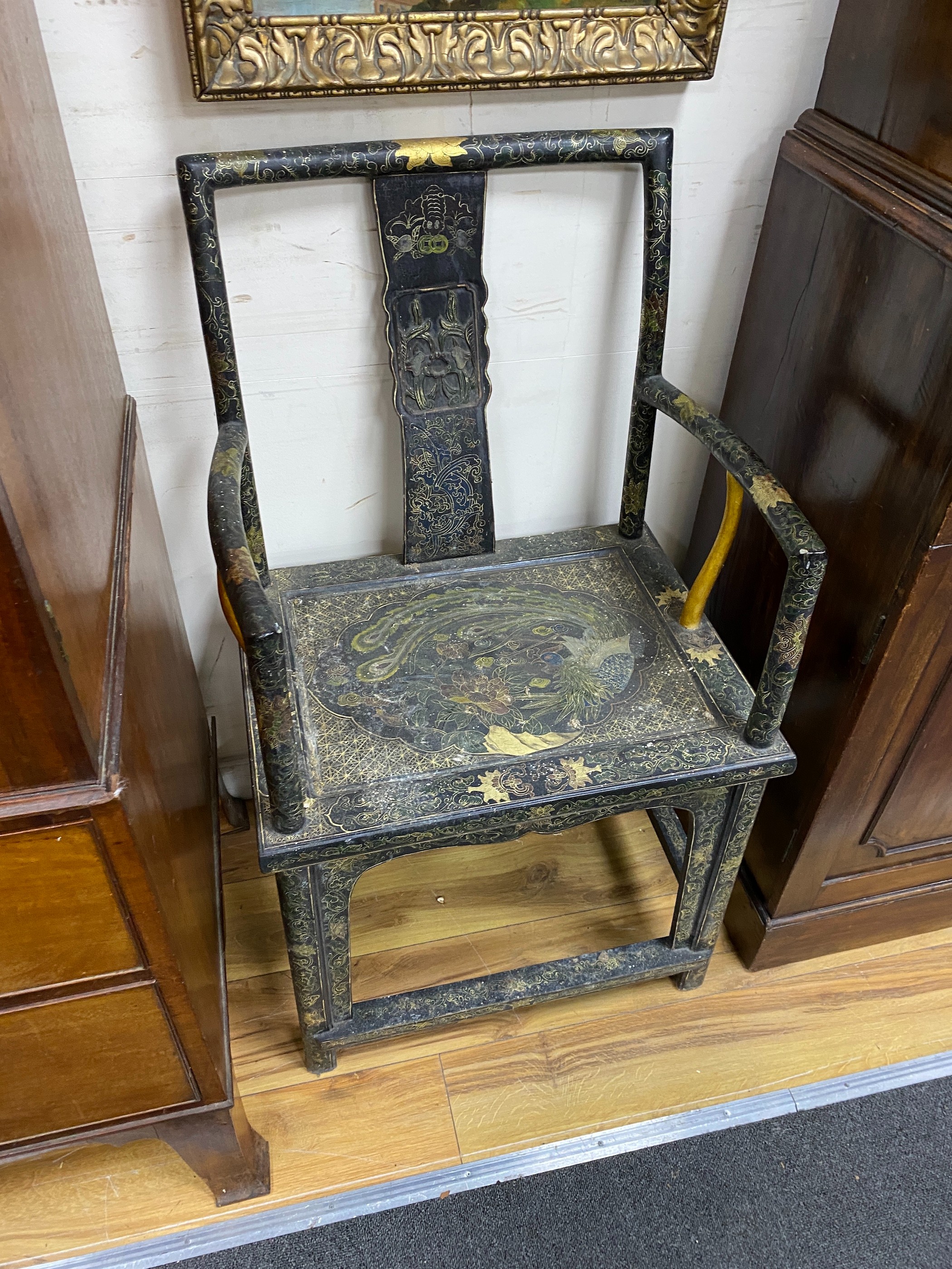 Three Chinese lacquered elbow chairs, width 56cm depth 42cm height 98cm